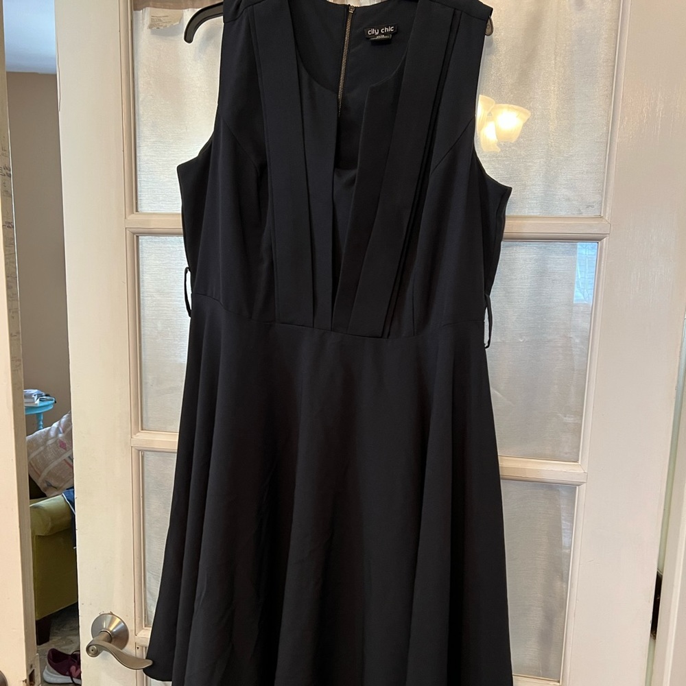 Navy fit and flare from City Chic; Square pleating over bodice